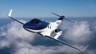 Aircraft clouds flying hondajet skyscapes wallpaper