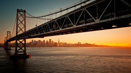 Oakland bay san francisco bridges cityscapes sunset wallpaper