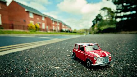 Close-up cars houses miniature roads macro effect wallpaper