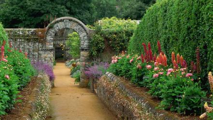 Flowers garden bushes archways wallpaper