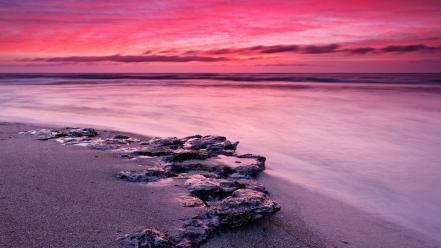 Beach sand stones sea wallpaper