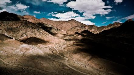 Clouds desert valley wallpaper
