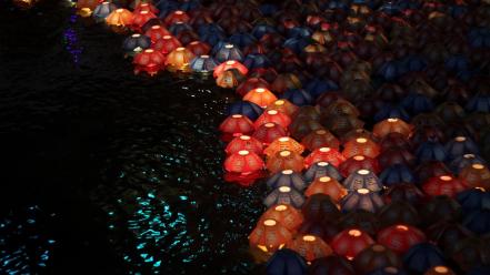 Water lights floating paper lanterns wallpaper