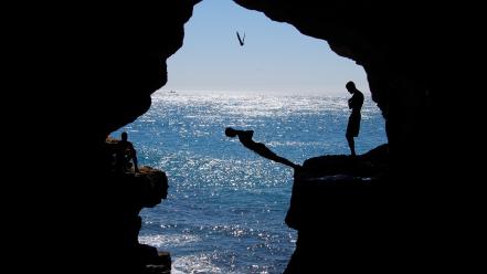 Birds silhouette rocks sunlight seagulls seascapes diving caves wallpaper