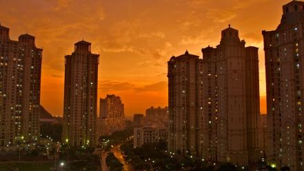 Sunset clouds tower buildings cities skies wallpaper