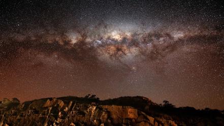 Mountains night stars rocks points sky wallpaper