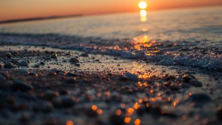 Sunset sand bokeh pebbles seascapes sea shorelines wallpaper