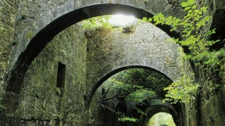 Spain sunlight branches stone buildings man made wallpaper