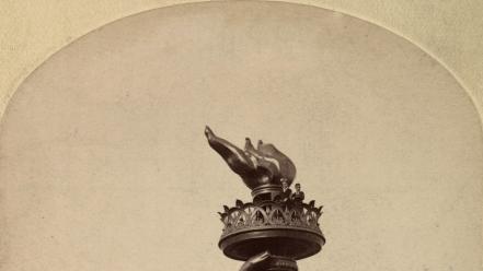 Hands historic torch liberty old photography wallpaper