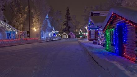 Snow trees streets houses christmas lights evergreens wallpaper