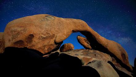 Rocks night sky arches rock formations wallpaper