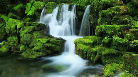 Mossy rock waterfall wallpaper