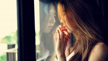 Girl looking out the window wallpaper