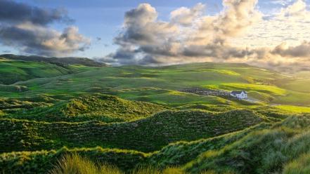 White grass houses hills ireland light blue wallpaper