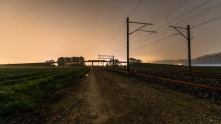 Landscapes night trains railroad tracks roads low light wallpaper