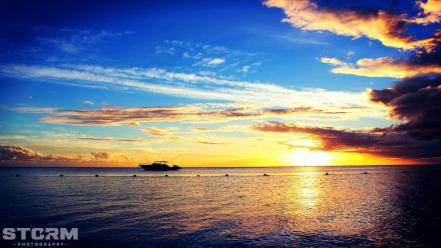 Mauritius sun beams blue boats wallpaper