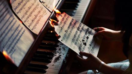 Burning music notes piano wallpaper