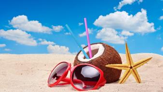 Beach sand sunglasses straws starfish coconut blue skies wallpaper