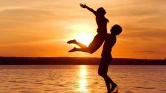 Couple love nature silhouettes sunset