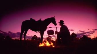Cowboys horses silhouettes wallpaper