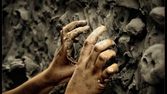 Crawling gray hands mold mud wallpaper