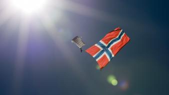 Sun parachuting blue skies flag of norway wallpaper