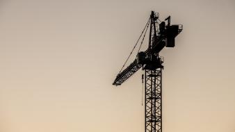 Company growth crane heavy equipment wallpaper