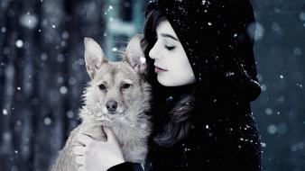 Women snow dogs wallpaper