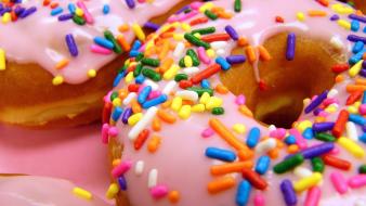 Close-up multicolor food donuts sprinkles wallpaper