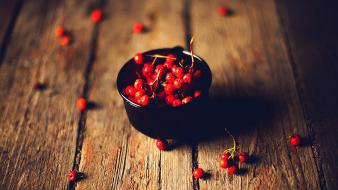 Cherries bowls depth of field wooden floor