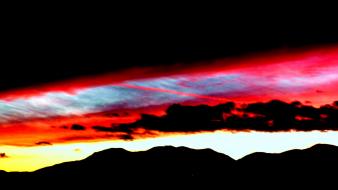 Sunset mountains clouds sun skies wallpaper
