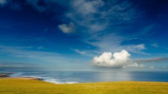 Green blue ocean clouds coast meadow land sky wallpaper