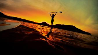 Sunset ocean waves paddleboarding board stand up