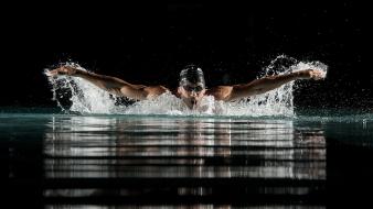 Wet men black background swimmer wallpaper
