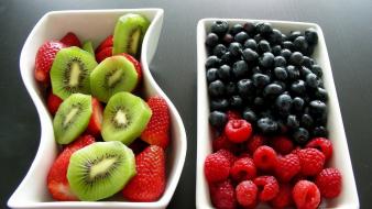 Red yellow fruits food kiwi strawberries bowl wallpaper