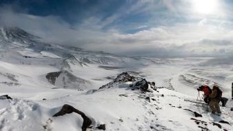 Mountains snow skiing skies wallpaper