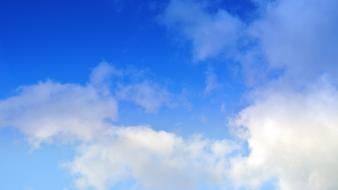 Blue clouds skies wallpaper