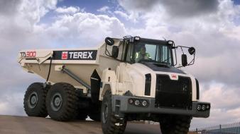 Clouds trucks vehicles terex wallpaper