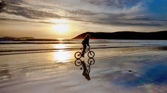 Sunrise landscapes beach bicycles