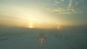Sunset snow runway landing aviation blizzard lighting wallpaper