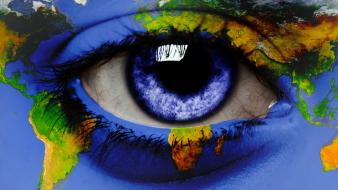 Close-up eyes blue around world map eye wallpaper