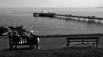 Black and white pier bench wales monochrome sea wallpaper