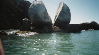 Water rocks stones sea shorelines wallpaper