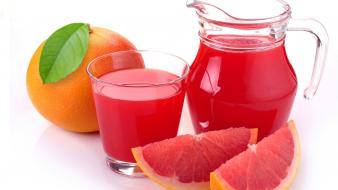 Drinking glass grapefruits juice wallpaper