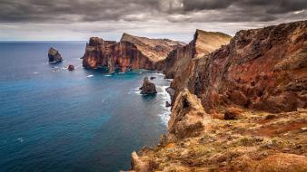 Cliff coast dark clouds landscapes nature