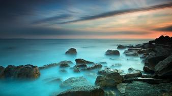 Sunset ocean rocks beach wallpaper