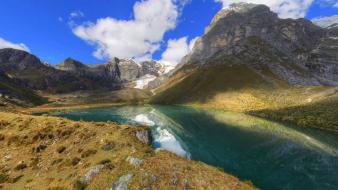 Andes peru clouds grass lagoon wallpaper