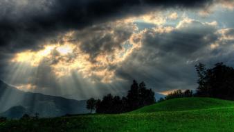 Clouds hills landscapes overcast sunbeams wallpaper