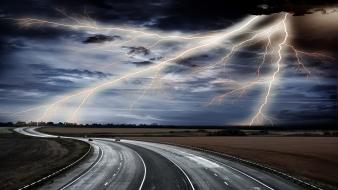 Cars storm roads lighting