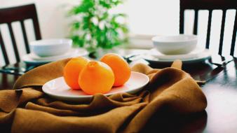 Blurred background fruits napkins oranges plates wallpaper